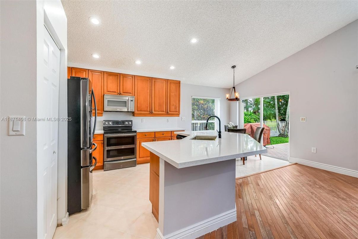 Interior, Kitchen, Pendant Lights, Recessed Lighting, Stainless Steel Appliances, Wood Texture Flooring