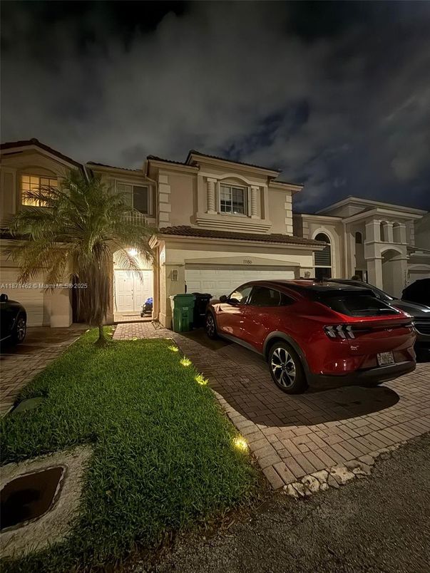 Attached, Exterior, Facade, Mediterranean