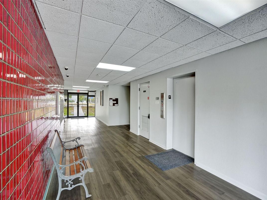 Elevator, Interior, Recessed Lighting, Wood Texture Flooring