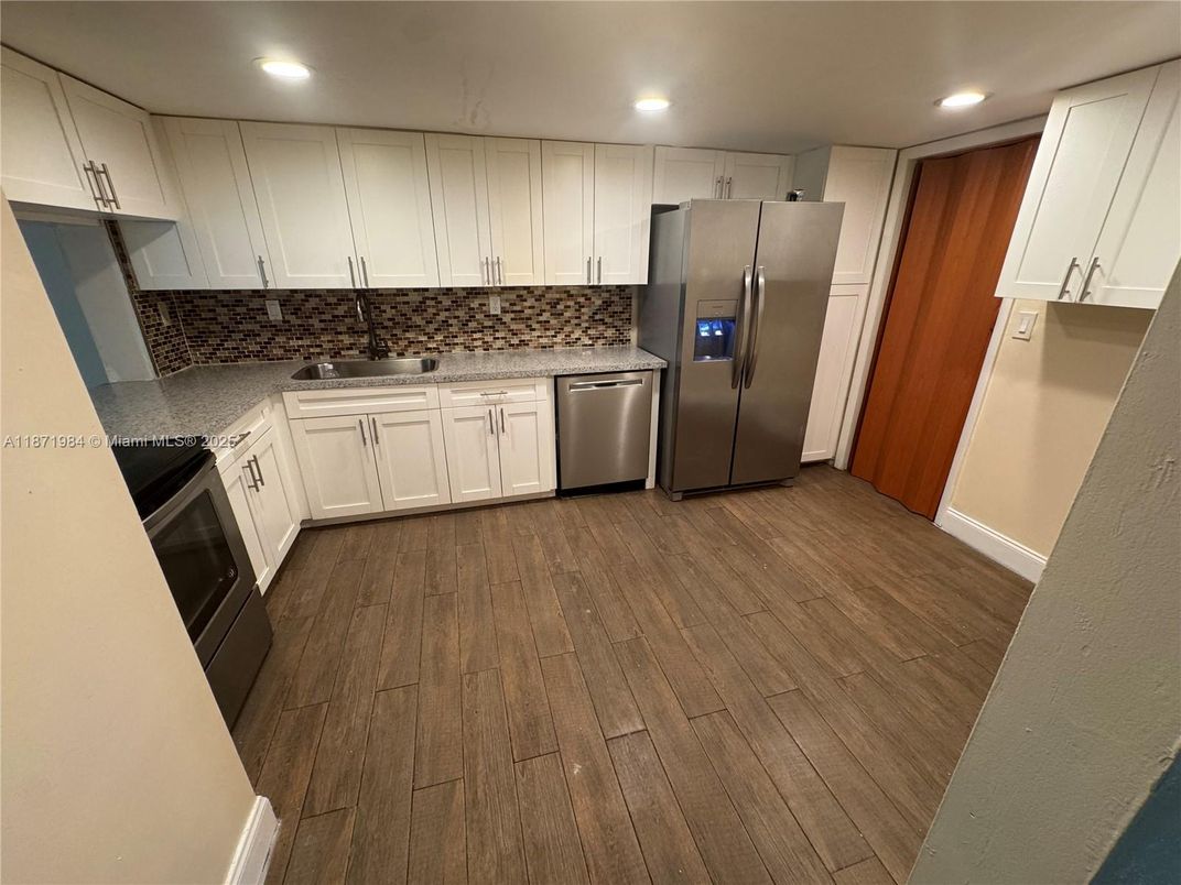 Interior, Kitchen, Recessed Lighting, Stainless Steel Appliances, Wood Texture Flooring