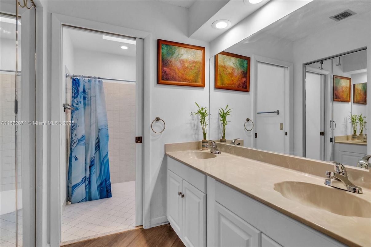 Bathroom, Dual Sink Vanities, Interior, Recessed Lighting, Wood Texture Flooring