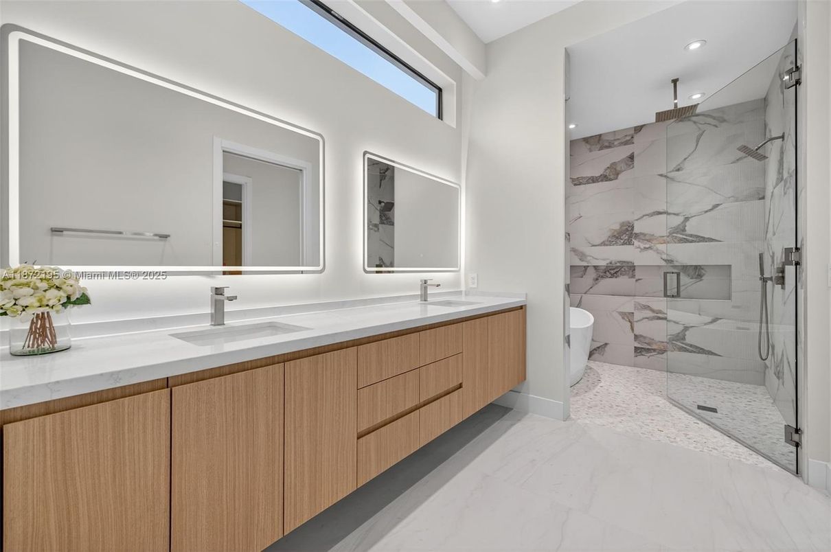 Bathroom, Dual Sink Vanities, Glass Shower, Interior, Marble, Marble Walls, Recessed Lighting