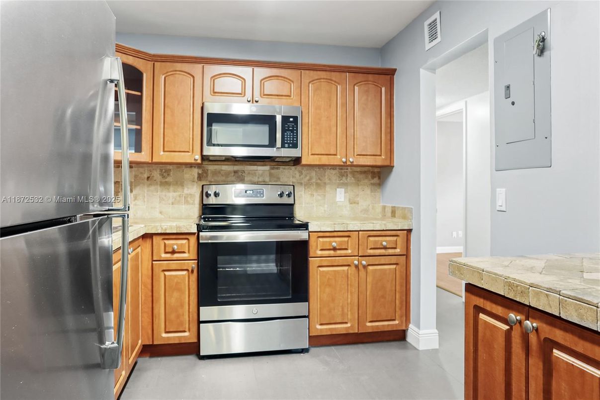 Interior, Kitchen, Stainless Steel Appliances, Tile Countertops