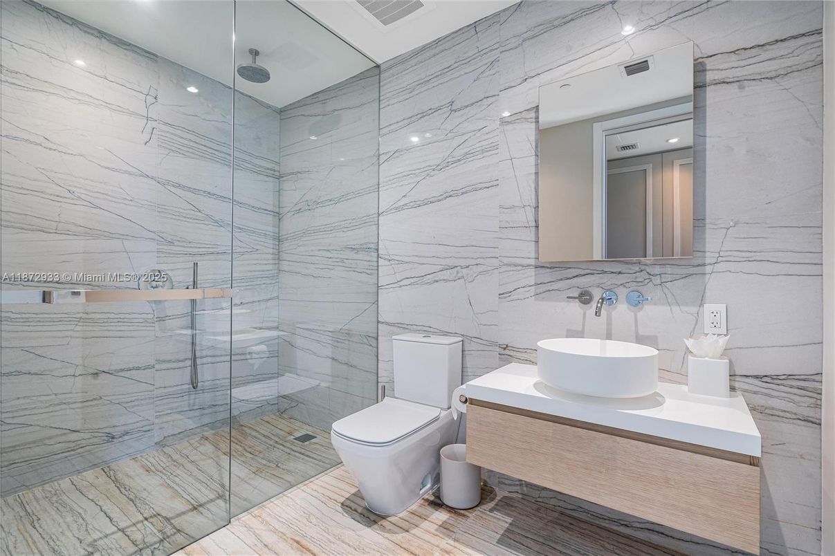 Bathroom, Glass Shower, Interior, Marble Walls, Recessed Lighting, Wood Texture Flooring