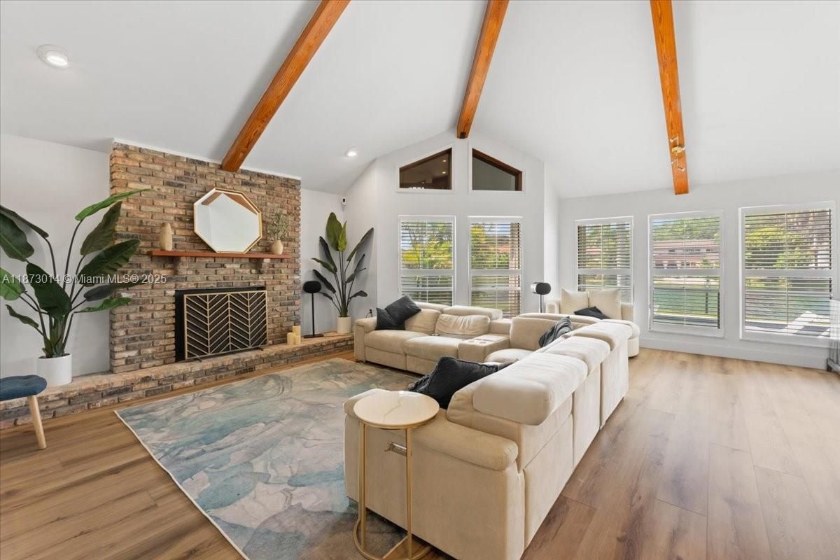 Fireplace, Interior, Living room, Recessed Lighting, Stone Walls, Wooden Beams, Wood Texture Flooring