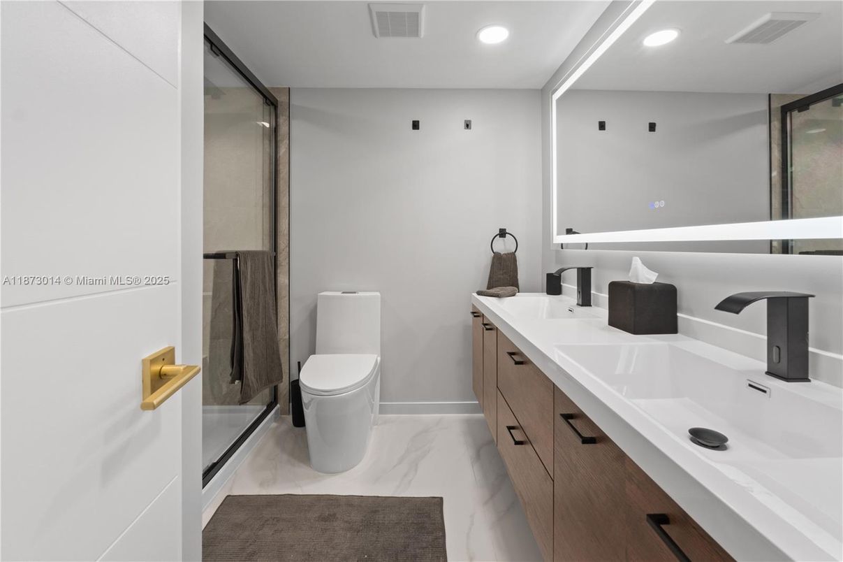 Bathroom, Dual Sink Vanities, Glass Shower, Interior, Marble, Recessed Lighting