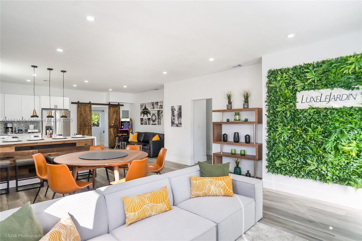 Dining room, Interior, Kitchen, Living room, Pendant Lights, Recessed Lighting, Stainless Steel Appliances, Wood Texture Flooring