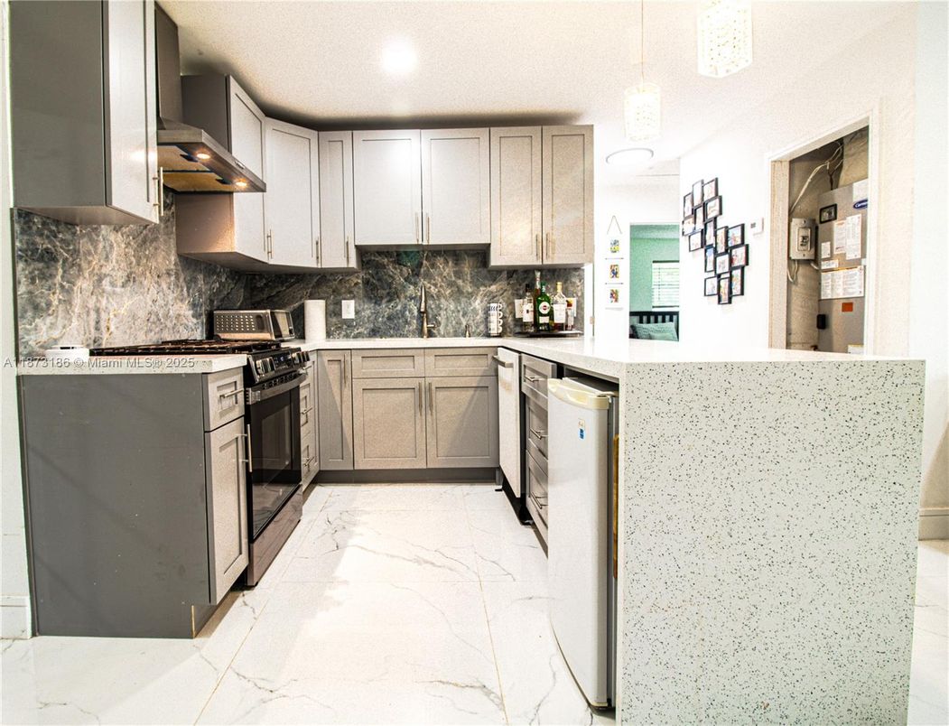 Interior, Kitchen, Marble, Pendant Lights, Recessed Lighting, Stainless Steel Appliances