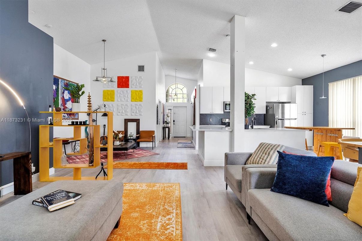 Fireplace, Interior, Kitchen, Living room, Pendant Lights, Recessed Lighting, Stainless Steel Appliances, Wood Texture Flooring