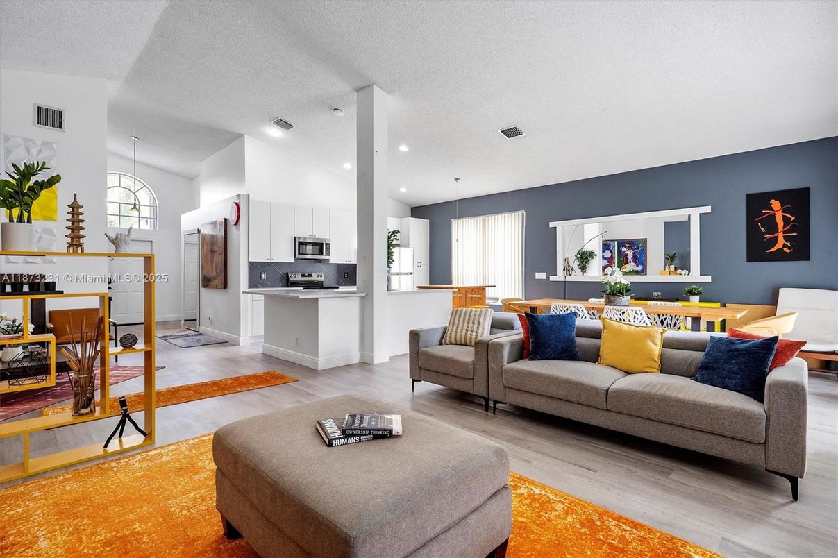 Dining room, Interior, Kitchen, Living room, Pendant Lights, Recessed Lighting, Stainless Steel Appliances, Wood Texture Flooring