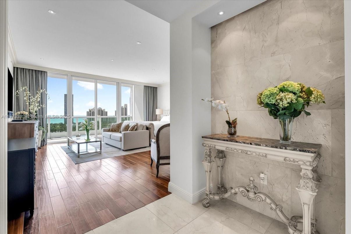 Interior, Living room, Marble Walls, Recessed Lighting, Water, Wood Texture Flooring
