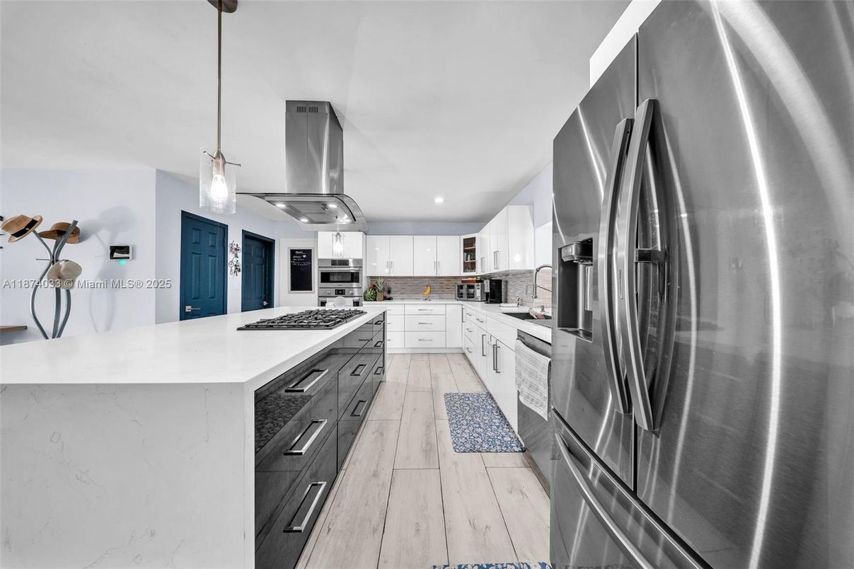 Interior, Kitchen, Pendant Lights, Recessed Lighting, Stainless Steel Appliances, Wood Texture Flooring