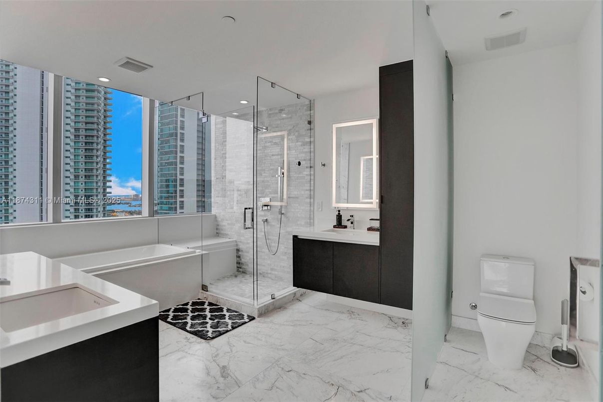 Bathroom, Dual Sink Vanities, Glass Shower, Interior, Marble, Recessed Lighting