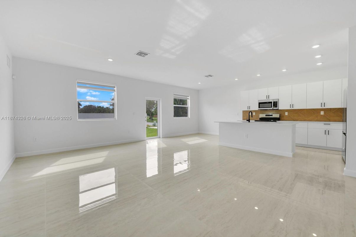 Empty room, Interior, Kitchen, Recessed Lighting, Stainless Steel Appliances