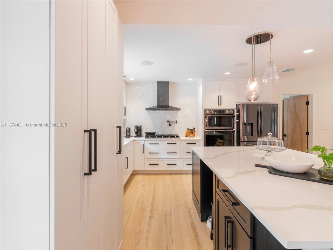 Interior, Kitchen, Pendant Lights, Recessed Lighting, Stainless Steel Appliances, Wood Texture Flooring