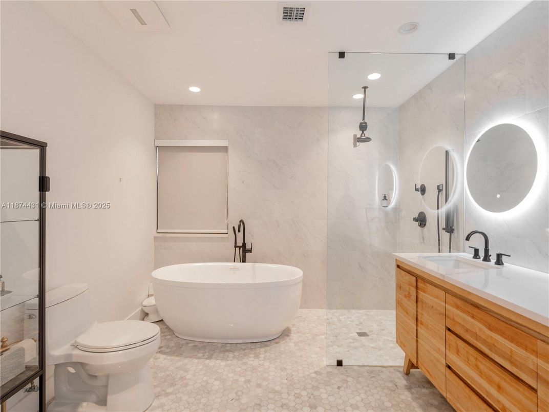 Bathroom, Dual Sink Vanities, Free Standing Baths, Glass Shower, Interior, Recessed Lighting