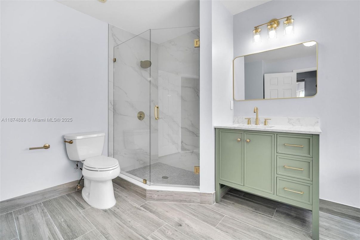 Bathroom, Glass Shower, Interior, Marble Walls, Wood Texture Flooring