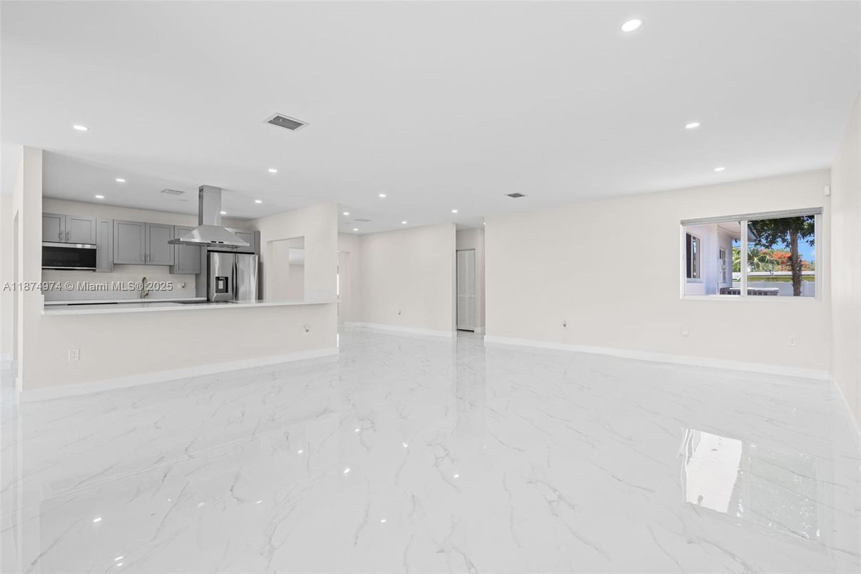 Empty room, Interior, Kitchen, Marble, Recessed Lighting, Stainless Steel Appliances