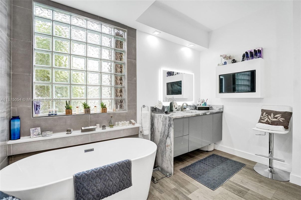 Bathroom, Dual Sink Vanities, Free Standing Baths, Interior, Recessed Lighting, Wood Texture Flooring