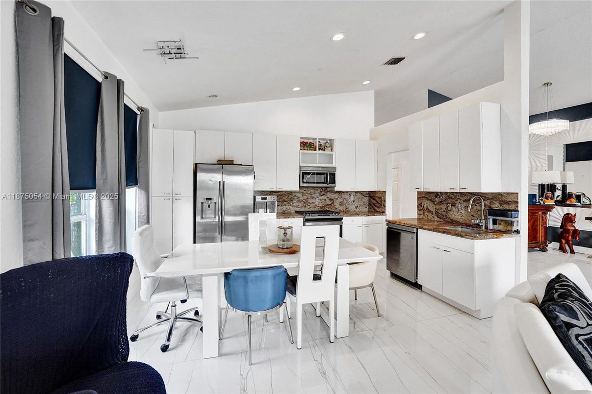 Dining room, Interior, Kitchen, Marble, Pendant Lights, Recessed Lighting, Stainless Steel Appliances