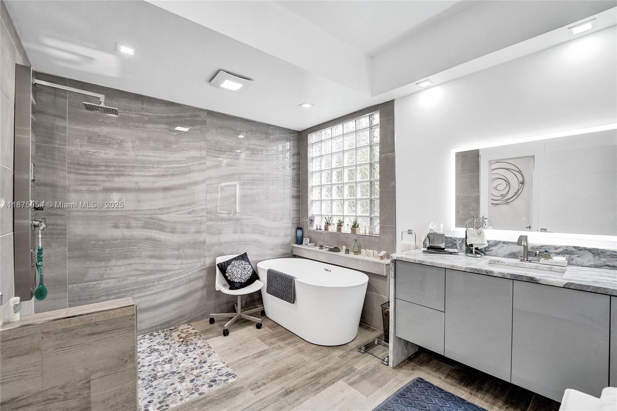 Bathroom, Dual Sink Vanities, Glass Shower, Interior, Recessed Lighting, Wood Texture Flooring