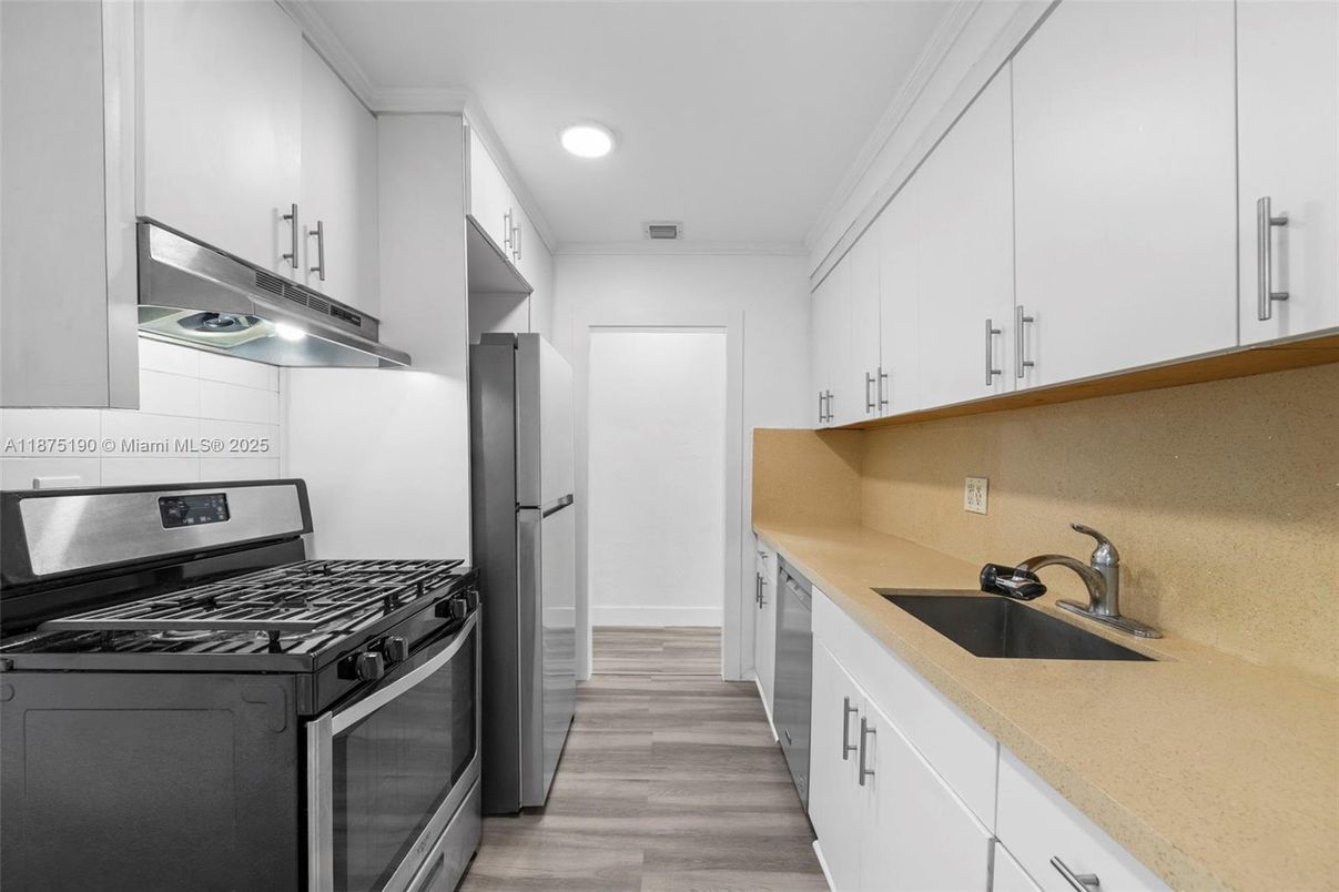 Interior, Kitchen, Recessed Lighting, Stainless Steel Appliances, Wood Texture Flooring