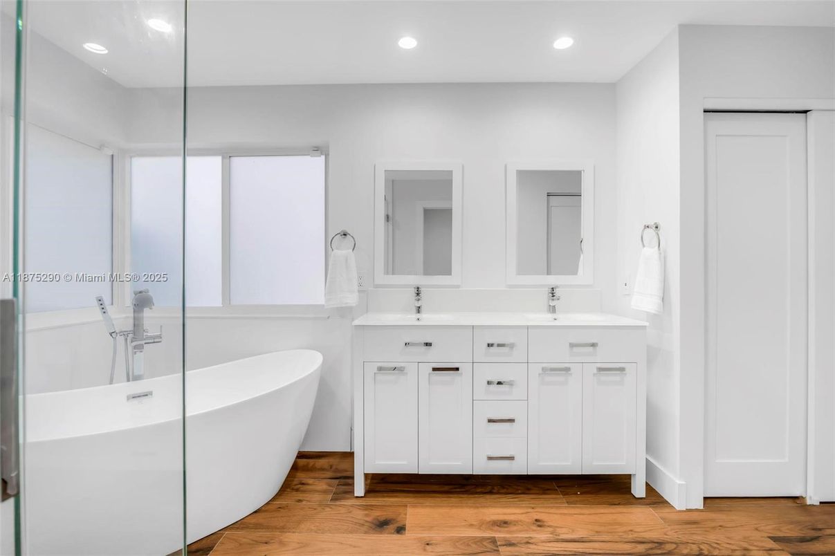 Bathroom, Dual Sink Vanities, Free Standing Baths, Interior, Recessed Lighting, Wood Texture Flooring