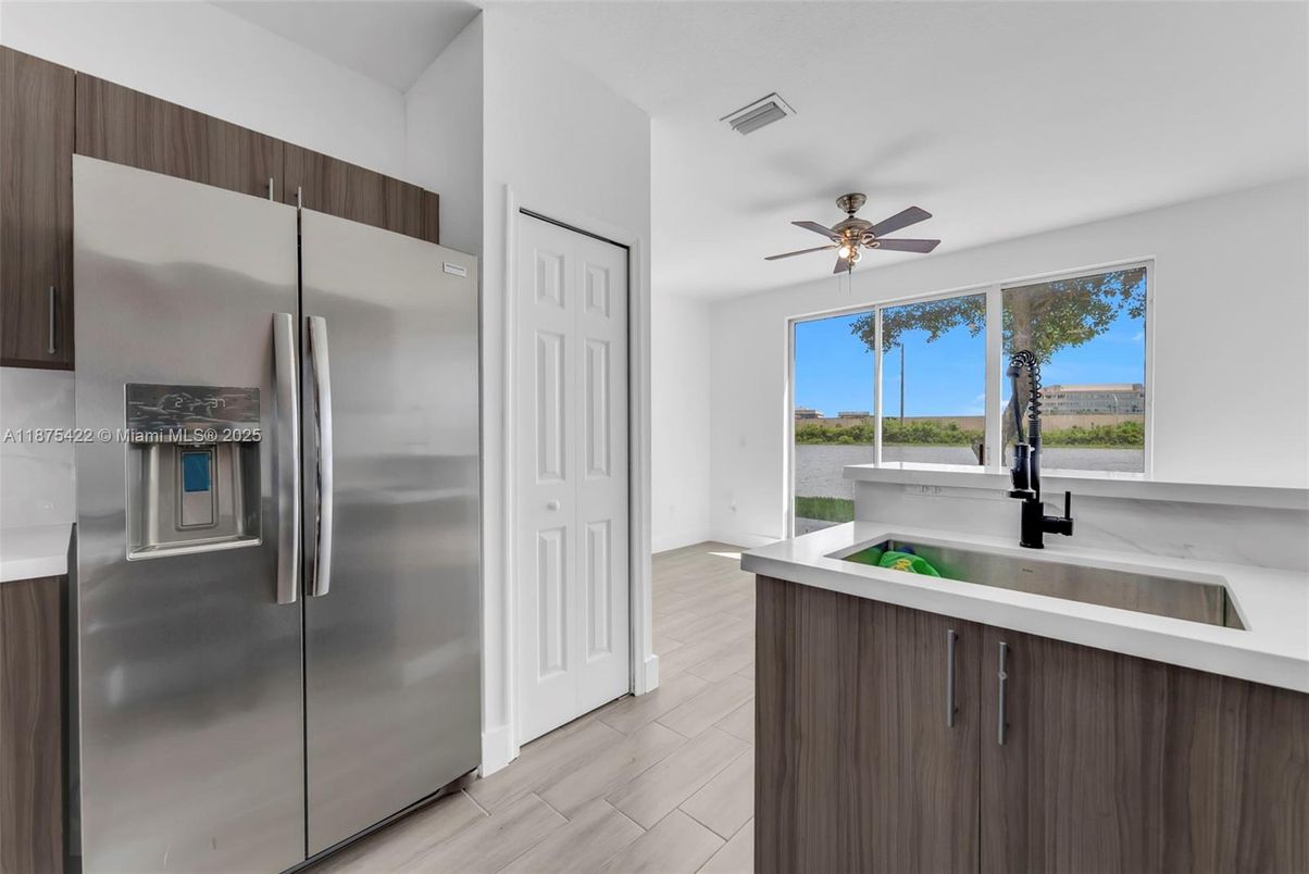 Interior, Kitchen, Stainless Steel Appliances, Water, Wood Texture Flooring