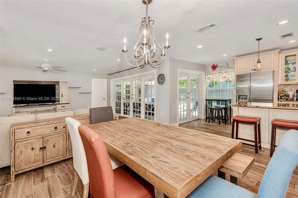 Chandelier, Dining room, Interior, Kitchen, Recessed Lighting, Stainless Steel Appliances, Wood Texture Flooring