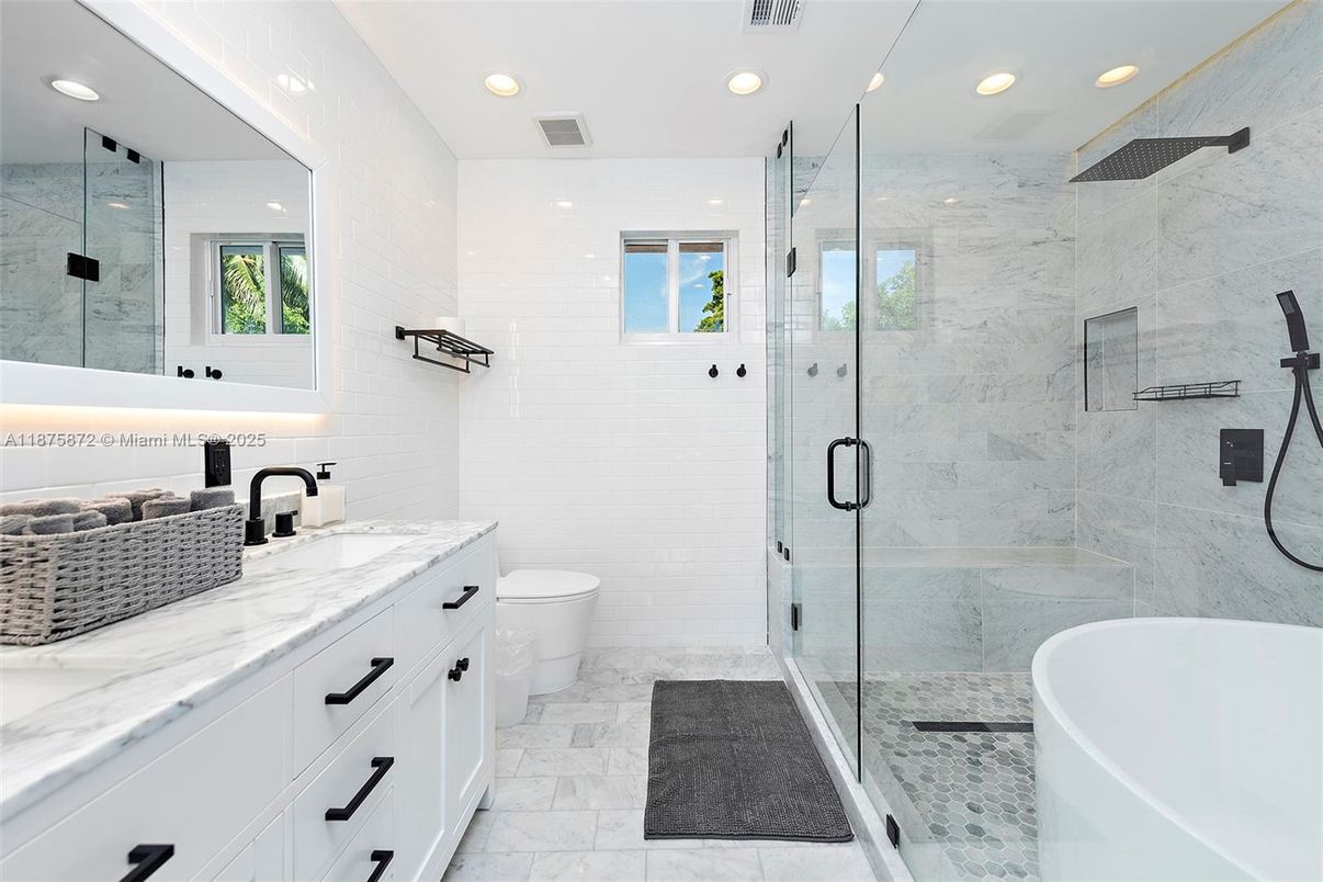 Bathroom, Dual Sink Vanities, Free Standing Baths, Glass Shower, Interior, Marble, Marble Walls, Recessed Lighting