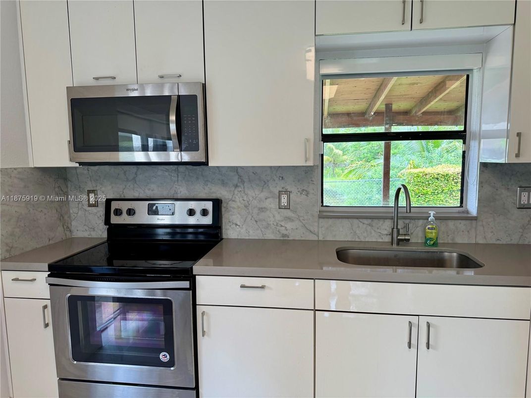 Interior, Kitchen, Marble Walls, Stainless Steel Appliances