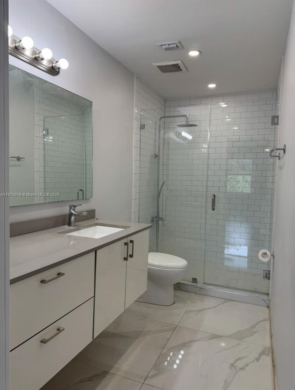 Bathroom, Dual Sink Vanities, Glass Shower, Interior, Marble, Recessed Lighting