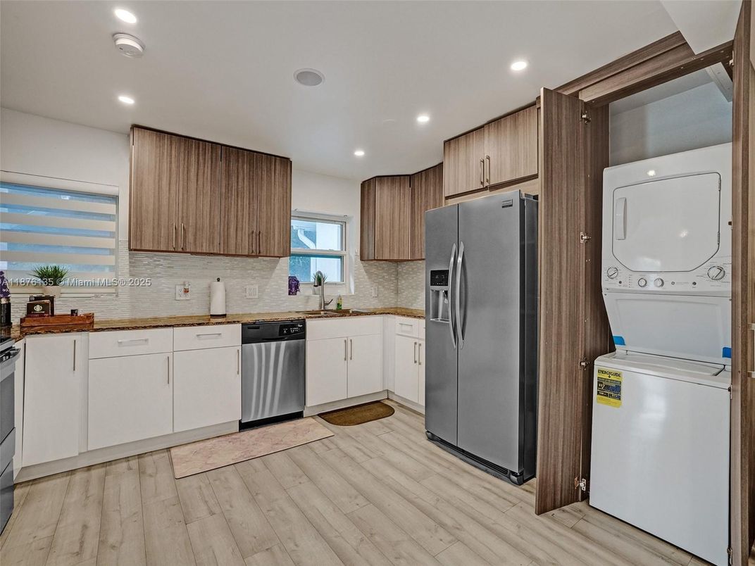 Interior, Kitchen, Recessed Lighting, Washer, Wood Texture Flooring