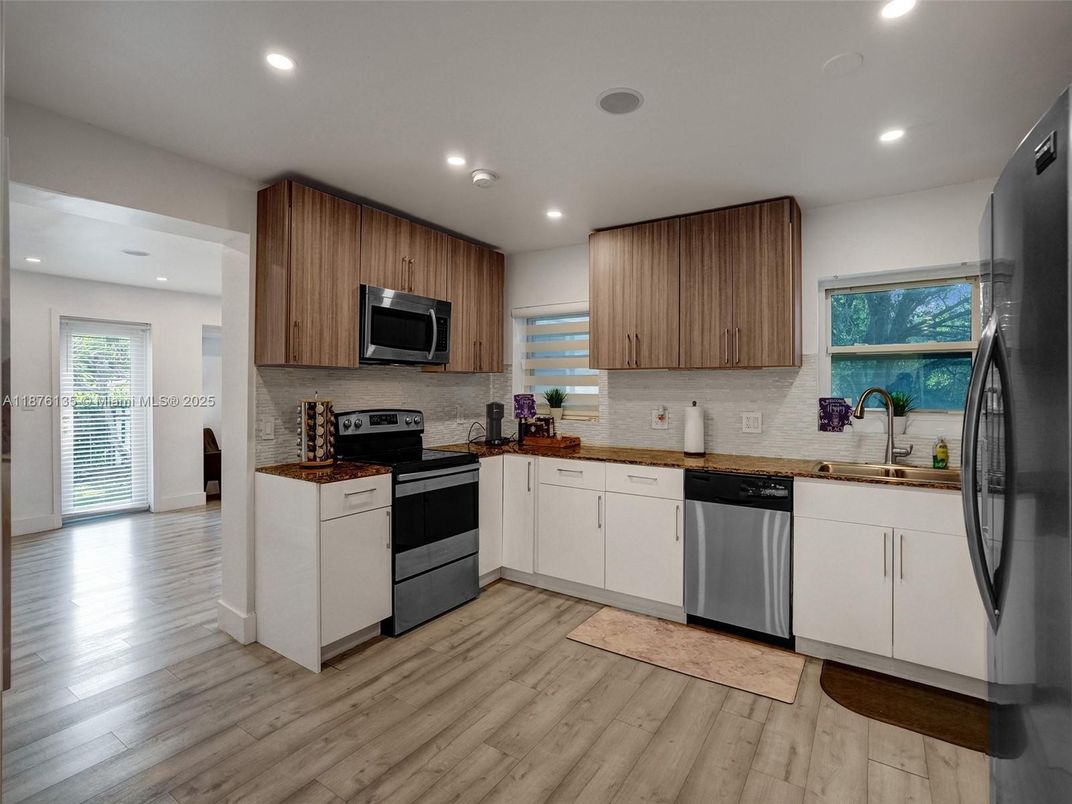 Interior, Kitchen, Recessed Lighting, Stainless Steel Appliances, Wood Texture Flooring