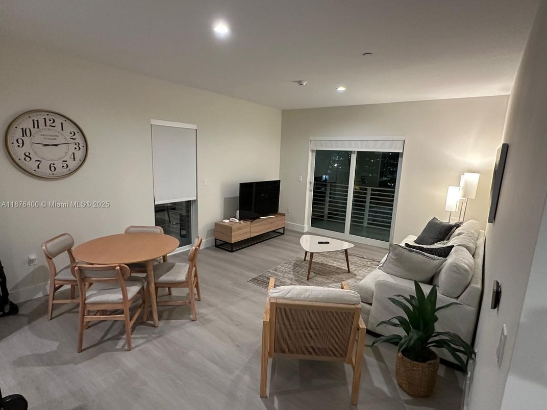 Dining room, Fireplace, Interior, Living room, Recessed Lighting, Wood Texture Flooring