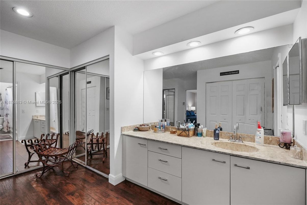Bathroom, Dual Sink Vanities, Interior, Recessed Lighting, Wood Texture Flooring