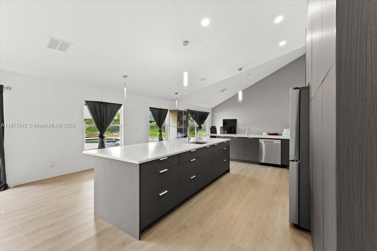 Interior, Kitchen, Pendant Lights, Recessed Lighting, Stainless Steel Appliances, Wood Texture Flooring