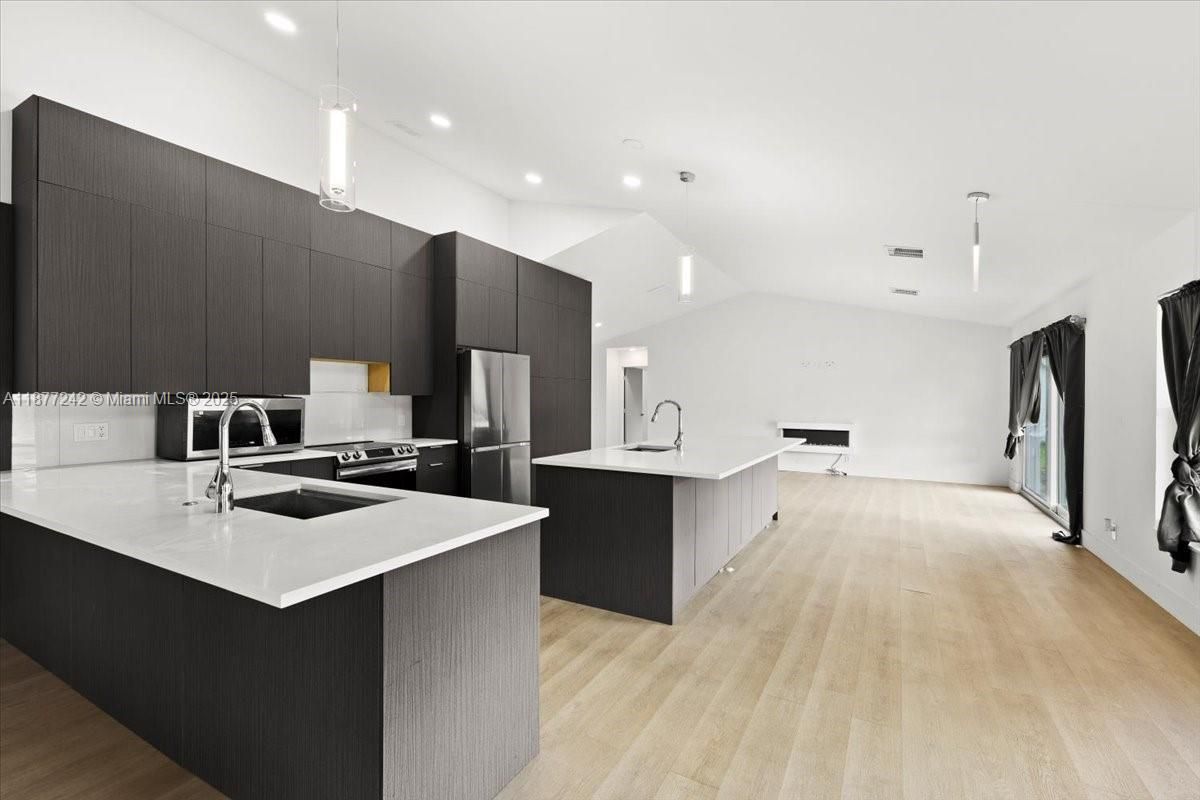 Interior, Kitchen, Pendant Lights, Recessed Lighting, Stainless Steel Appliances, Wood Texture Flooring