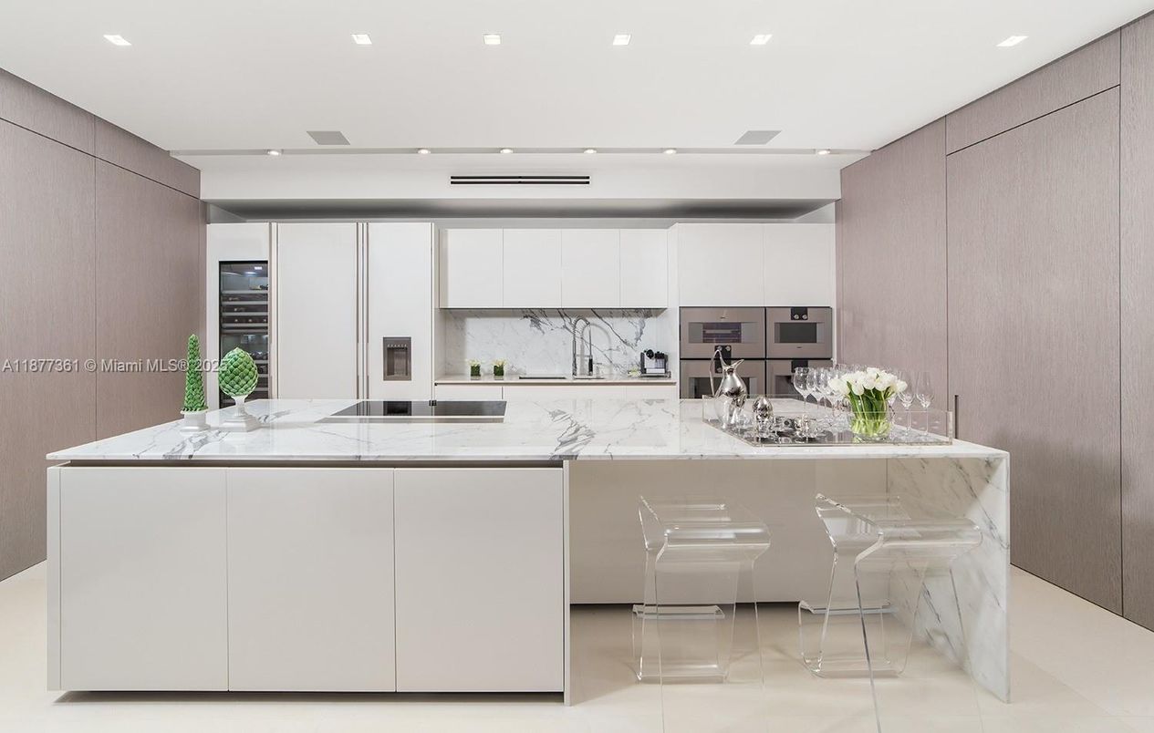 Interior, Kitchen, Marble Walls, Recessed Lighting, Stainless Steel Appliances