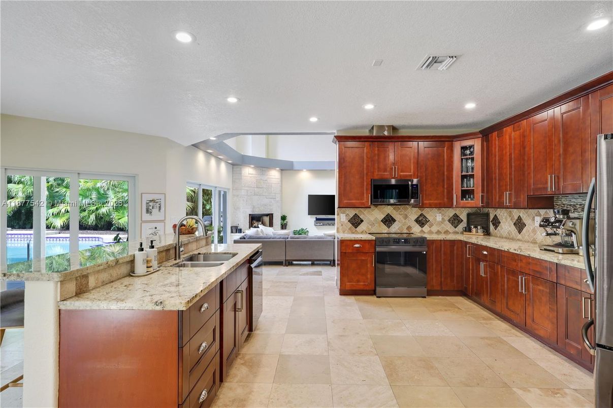 Fireplace, Interior, Kitchen, Living room, Recessed Lighting, Stainless Steel Appliances