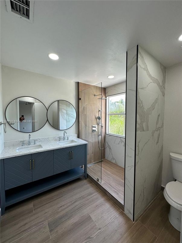 Bathroom, Glass Shower, Interior, Marble Walls, Recessed Lighting, Wood Texture Flooring