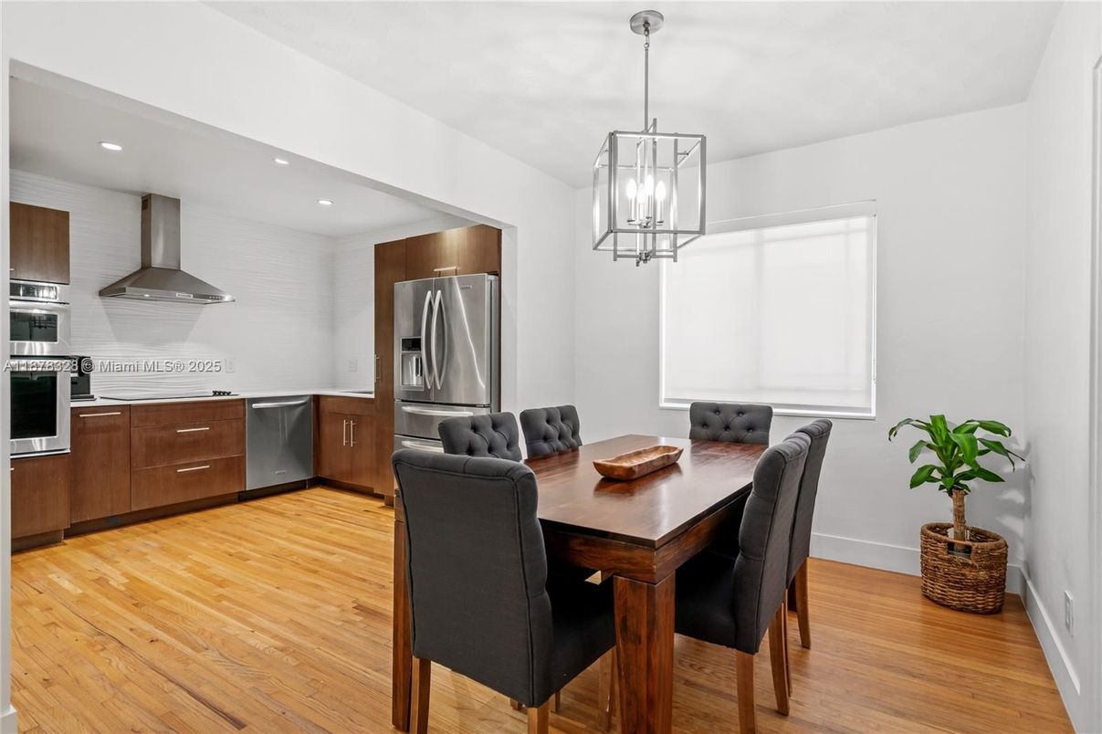 Dining room, Interior, Kitchen, Pendant Lights, Recessed Lighting, Stainless Steel Appliances, Wood Texture Flooring