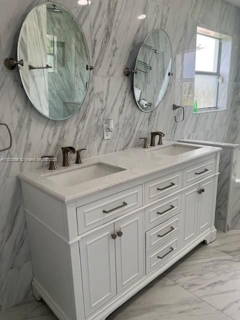 Bathroom, Dual Sink Vanities, Interior, Marble, Marble Walls, Recessed Lighting