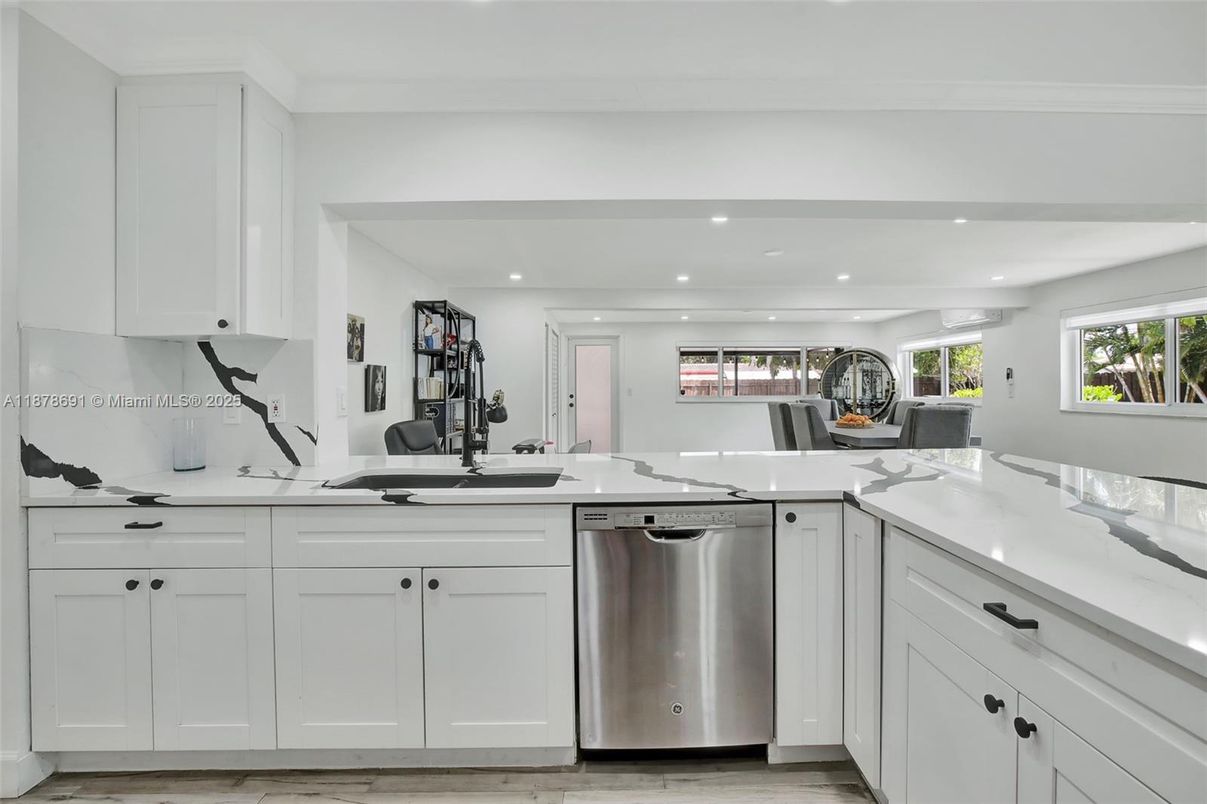 Dining room, Interior, Kitchen, Recessed Lighting, Stainless Steel Appliances, Wood Texture Flooring