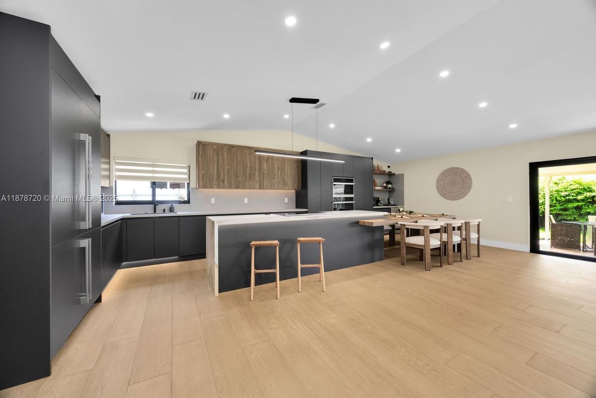 Dining room, Interior, Kitchen, Recessed Lighting, Stainless Steel Appliances, Wood Texture Flooring