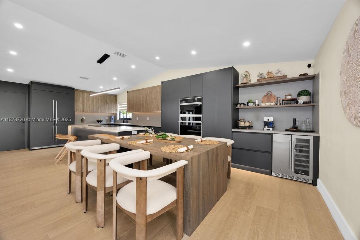 Dining room, Interior, Kitchen, Pendant Lights, Recessed Lighting, Stainless Steel Appliances, Wood Texture Flooring