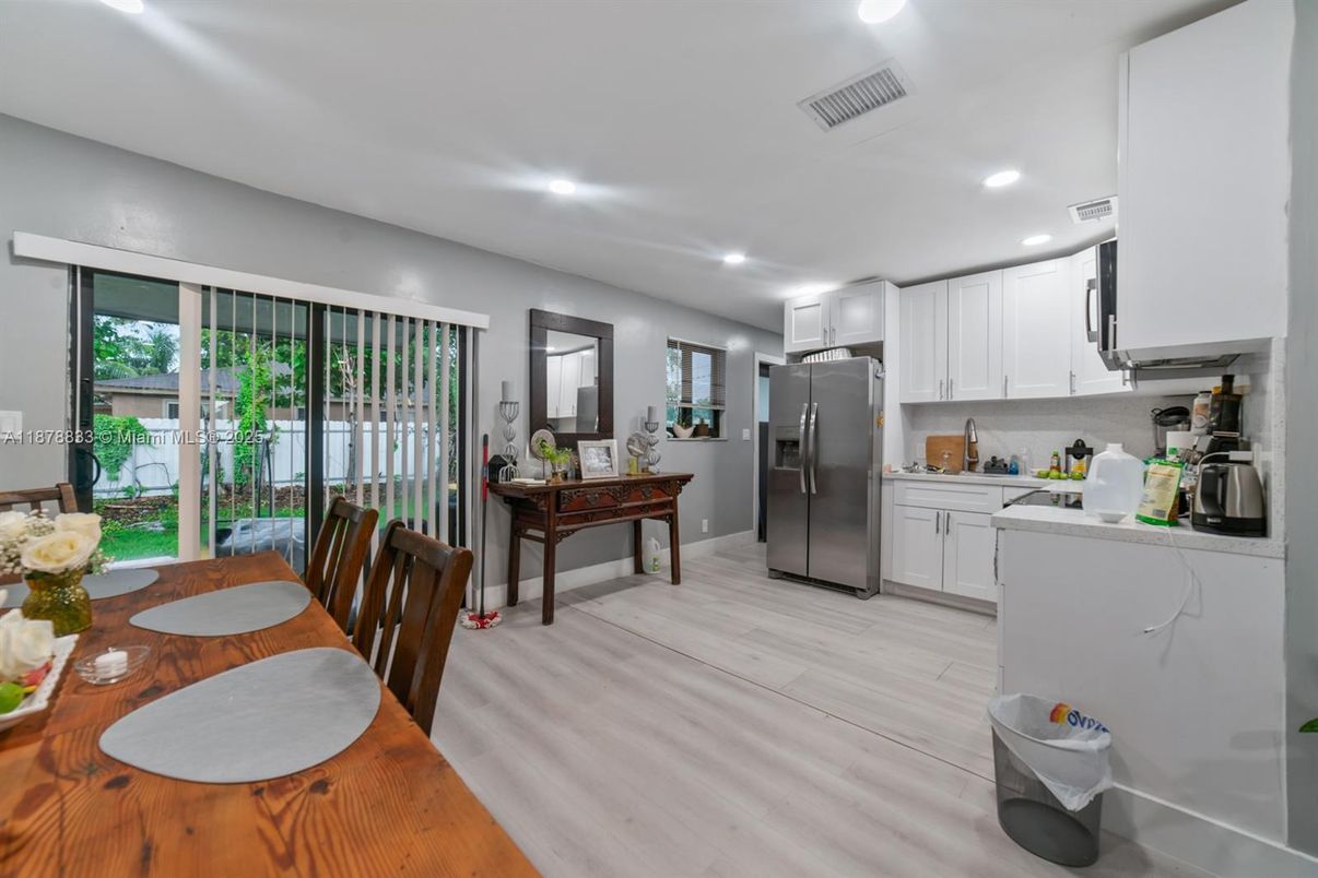Dining room, Interior, Kitchen, Recessed Lighting, Stainless Steel Appliances, Wood Texture Flooring