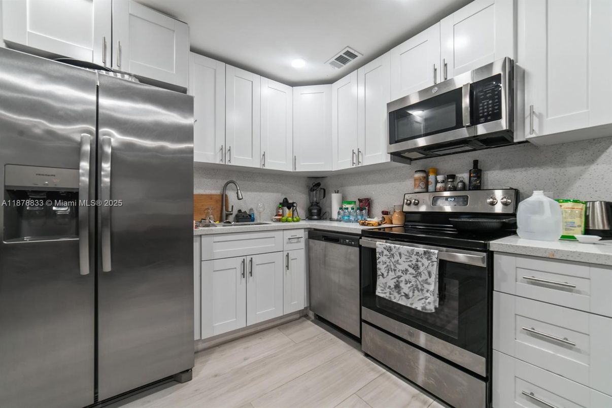 Interior, Kitchen, Recessed Lighting, Stainless Steel Appliances, Wood Texture Flooring