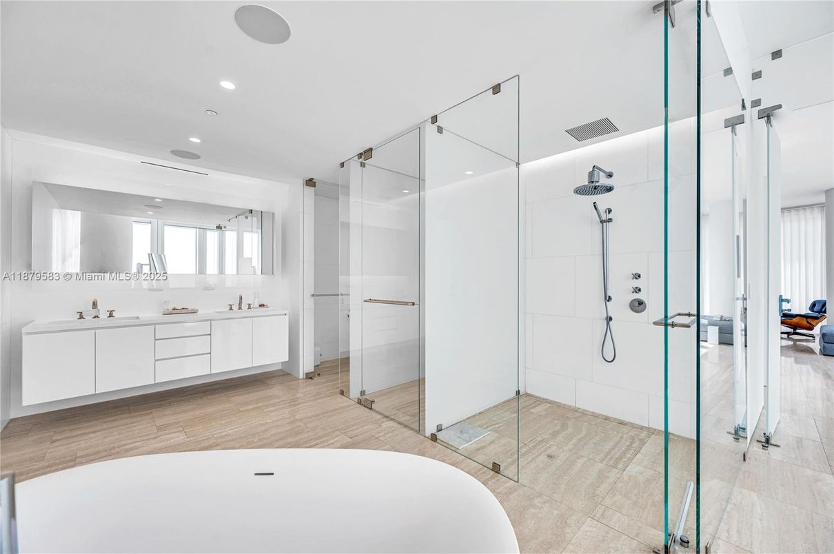 Bathroom, Dual Sink Vanities, Glass Shower, Interior, Recessed Lighting, Wood Texture Flooring