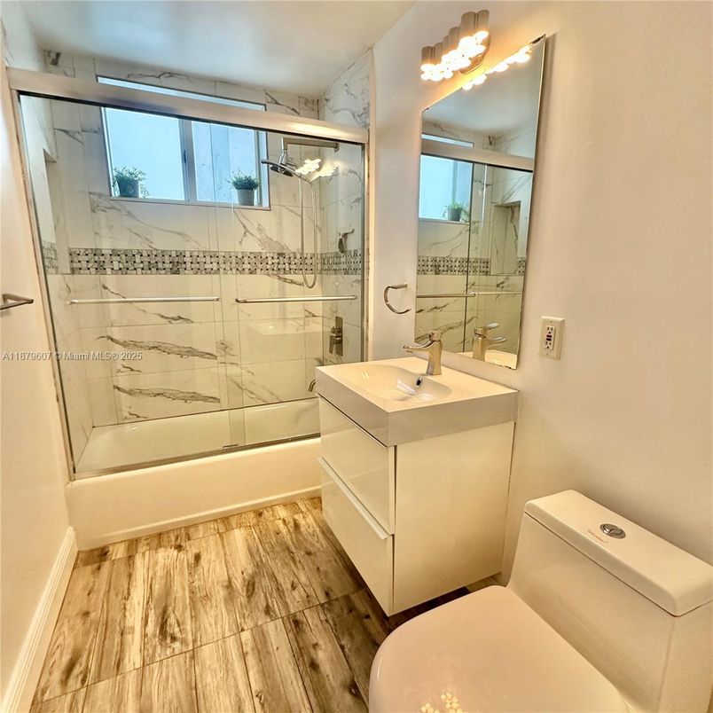 Bathroom, Glass Shower, Interior, Marble Walls, Wood Texture Flooring